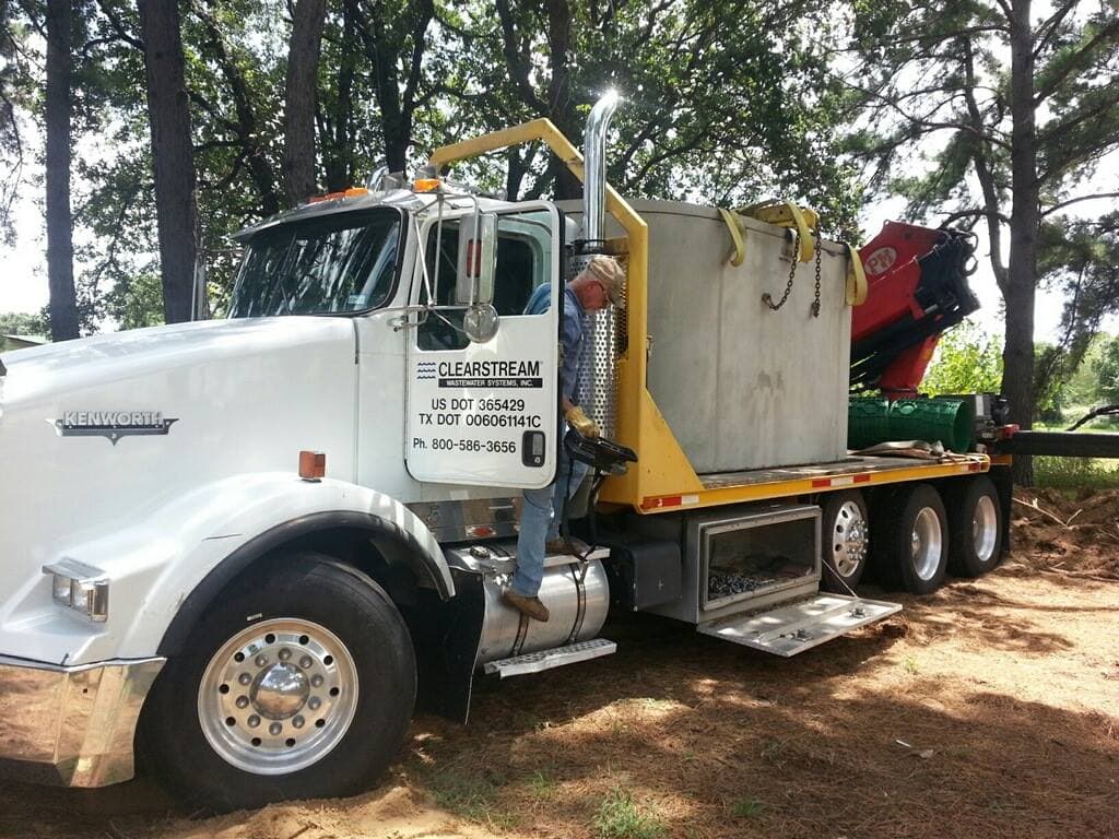Godley Septic Kenworth ClearStream install truck on a Johnson County jobsite — the rig that shows up at your Godley install